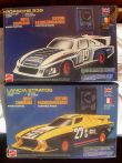 2 modellini telecomandati di auto da corsa risalenti al 1978 funzionanti con scatole d'epoca